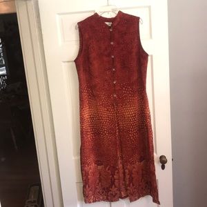 Really eye catching tunic in rust/orange